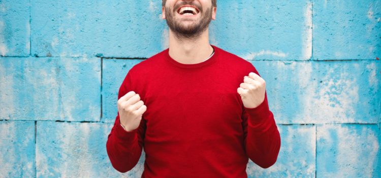 Happy man celebrating
